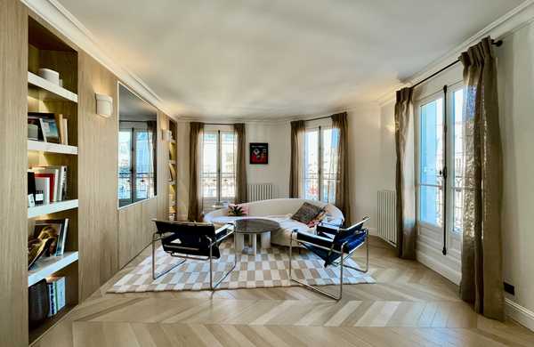 Réunion de deux appartements haussmanniens par un architecte d'intérieur à Paris